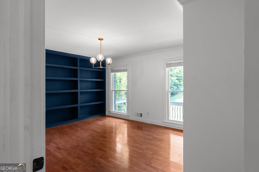 Nestled on a private wooded lot in the highly sought-after - photo 50