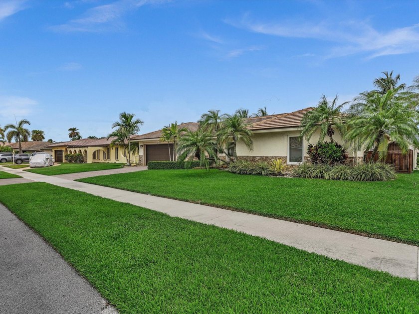 Rarely available deep water oversized lot. Newly updated home - photo 3