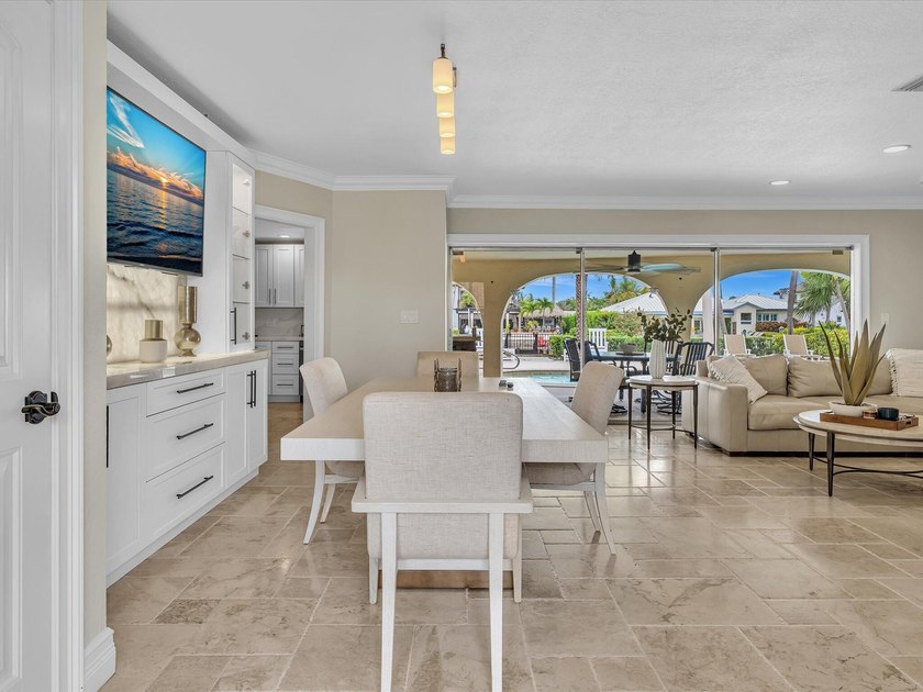 Rarely available deep water oversized lot. Newly updated home - photo 6