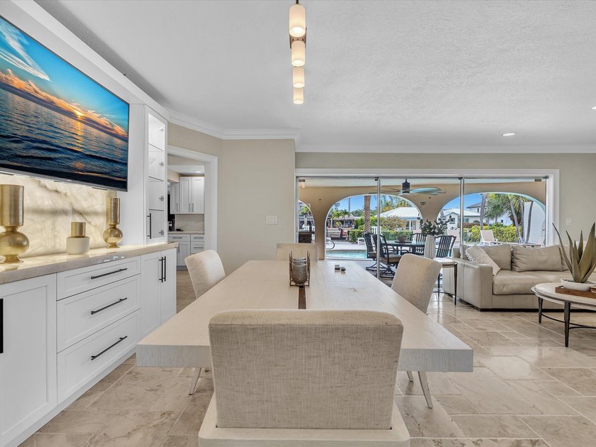 Rarely available deep water oversized lot. Newly updated home - photo 8