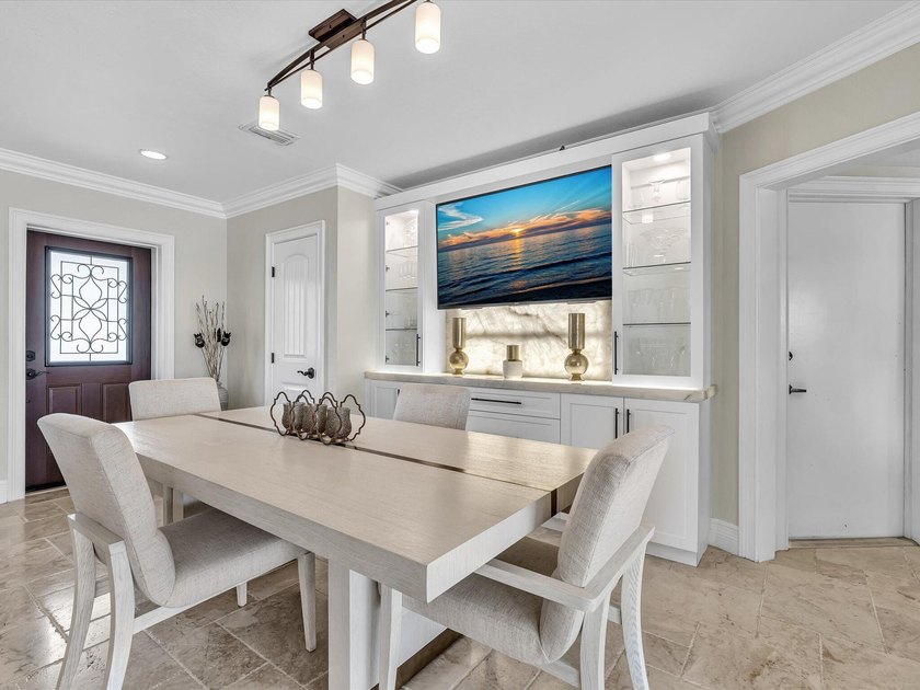 Rarely available deep water oversized lot. Newly updated home - photo 10