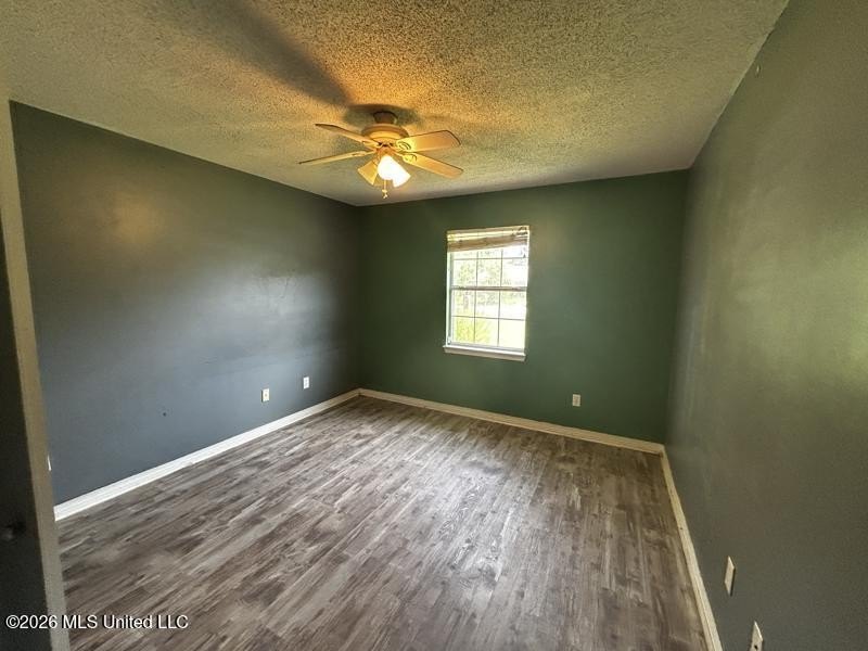 This property features 3 bedrooms and 2 bathrooms. Covered back - photo 12