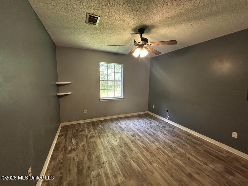 This property features 3 bedrooms and 2 bathrooms. Covered back - photo 14