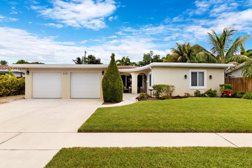 Discover this beautifully maintained 3-bedroom, 2-bath pool home - photo 2