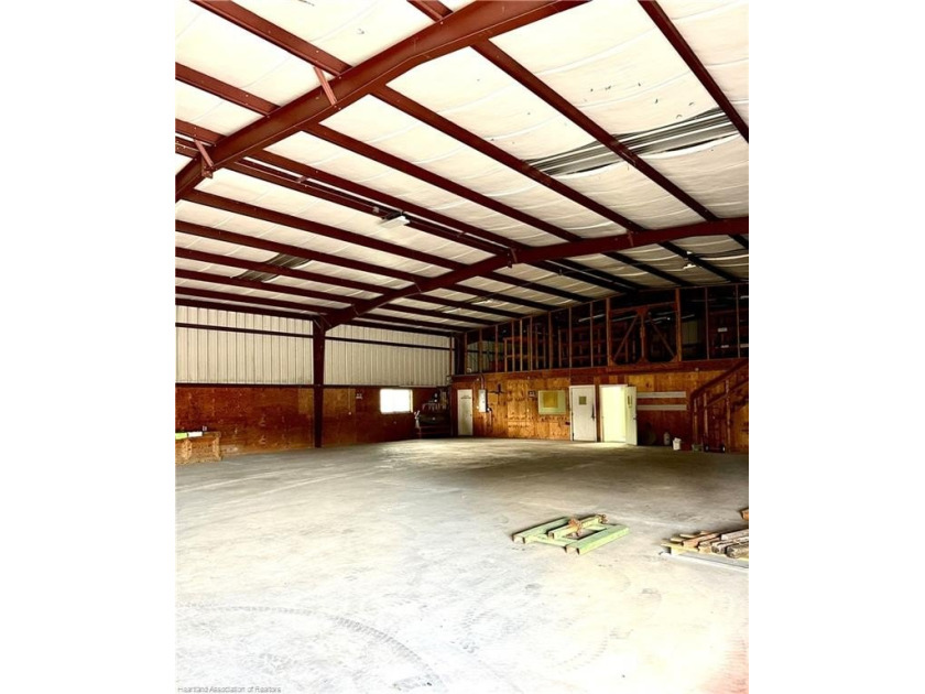This versatile industrial property offers two buildings on over - photo 22