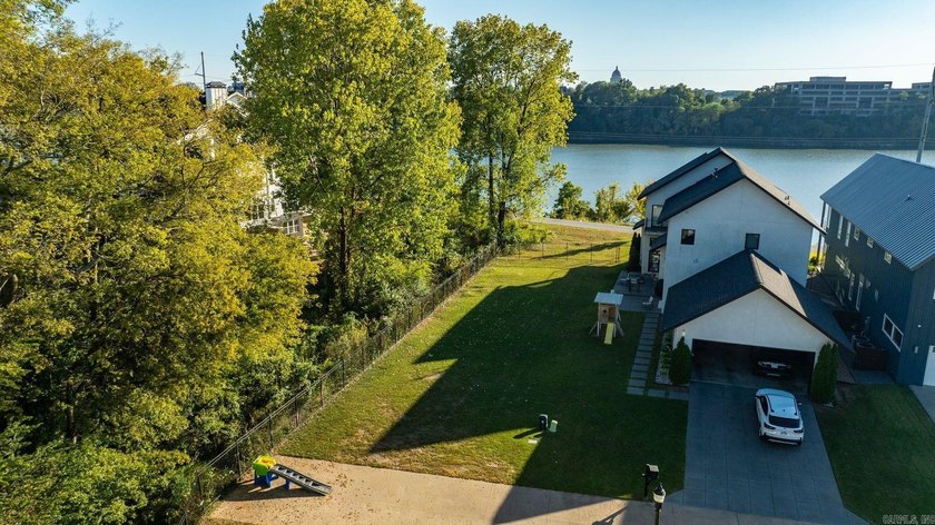 Discover a rare opportunity to own a riverfront lot with - photo 11