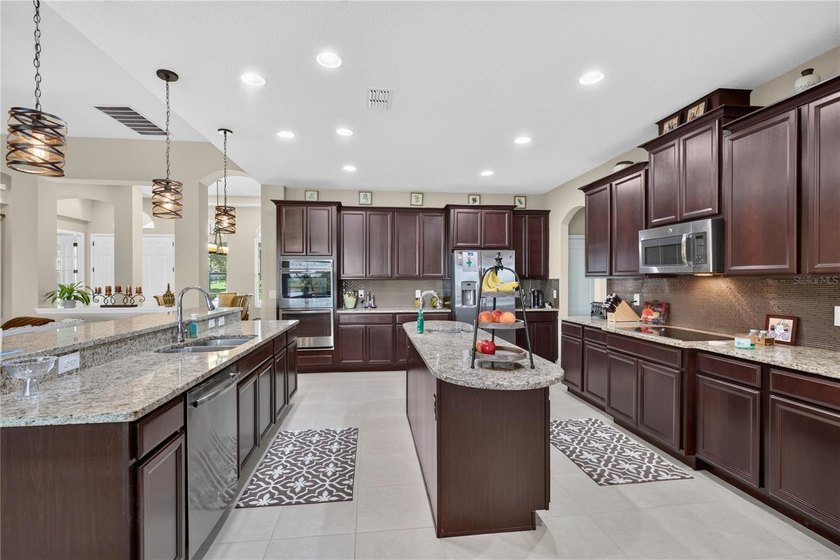 Virtually Staged. Enjoy golf and water views from this - photo 15