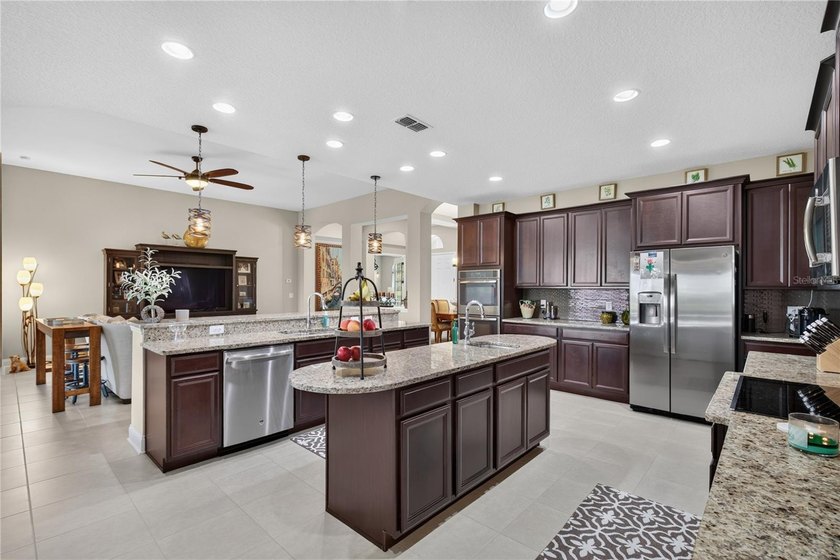 Virtually Staged. Enjoy golf and water views from this - photo 17
