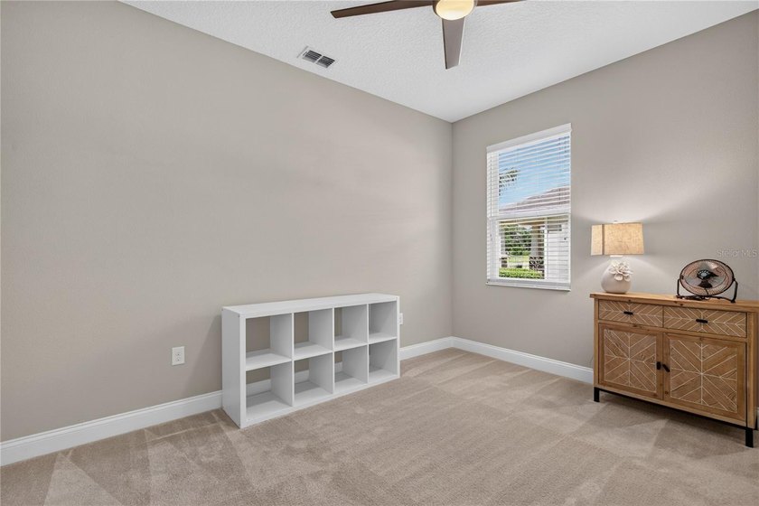 Virtually Staged. Enjoy golf and water views from this - photo 33
