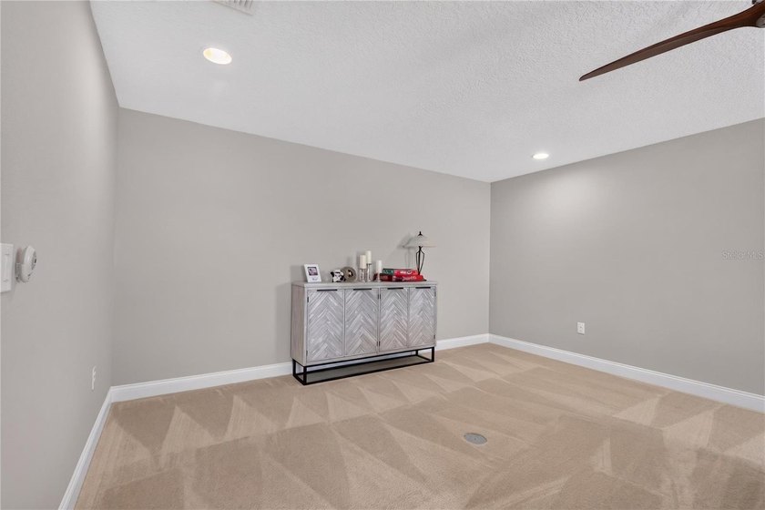 Virtually Staged. Enjoy golf and water views from this - photo 42