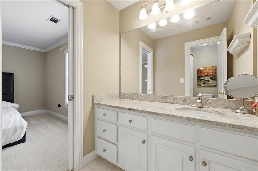 This luxurious +/-6,000 sq. ft. modern home, located in the - photo 22