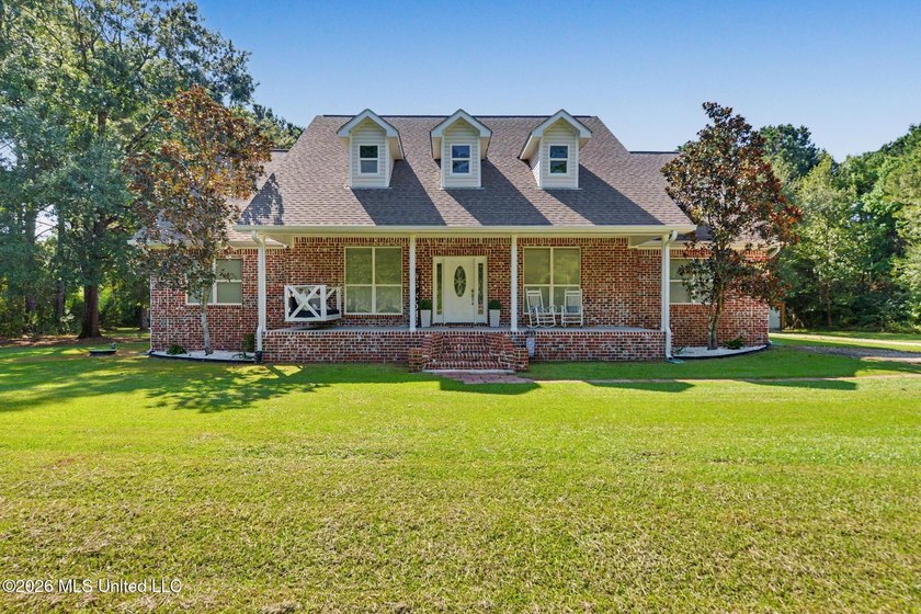 PRICE REDUCED! Situated on 7 acres with a pond and a 30' - photo 5
