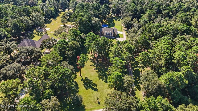 PRICE REDUCED! Situated on 7 acres with a pond and a 30' - photo 8