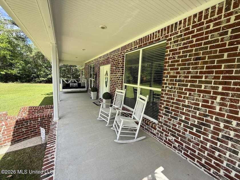 PRICE REDUCED! Situated on 7 acres with a pond and a 30' - photo 10