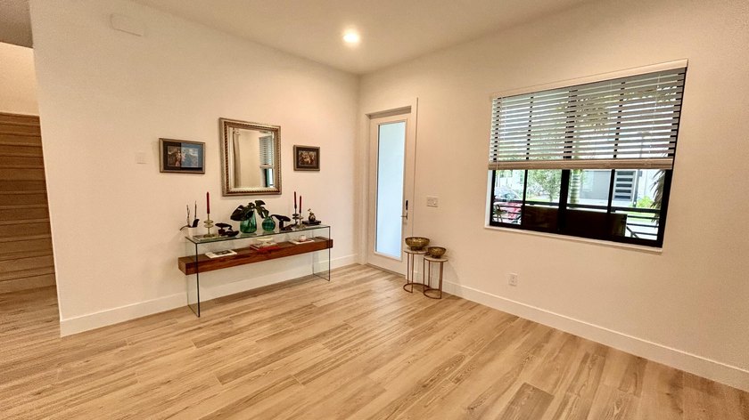 Welcome to this exceptional 4-bedroom, 3.5-bathroom residence in - photo 3