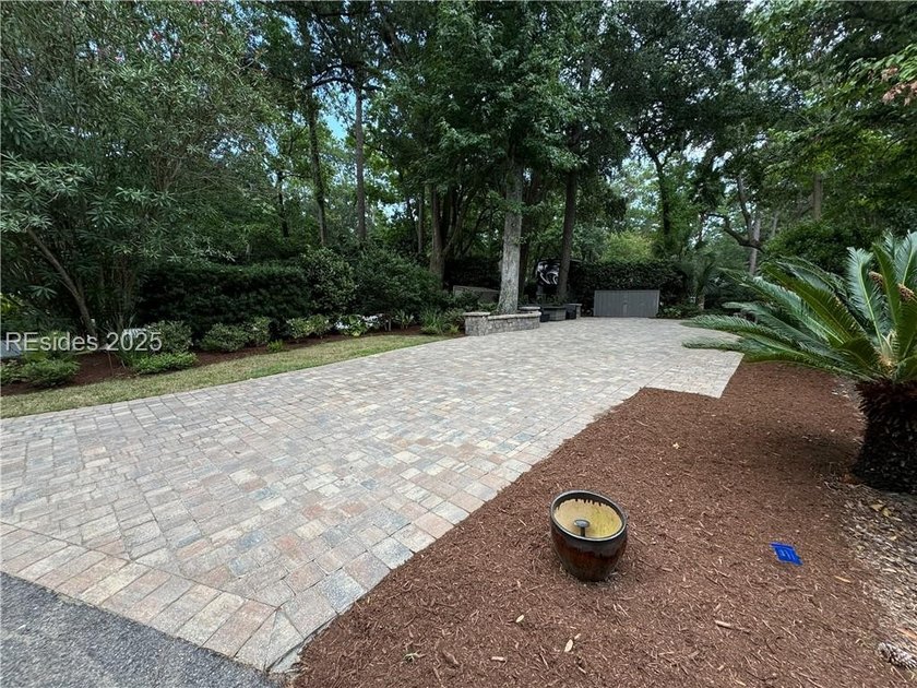 This gorgeous RV lot has a paver pad and a hardscape wall with - photo 6