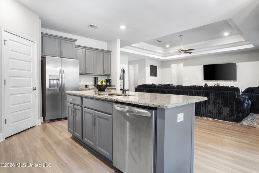 Welcome home to this beautifully maintained 4-bedroom, 3-bath - photo 15
