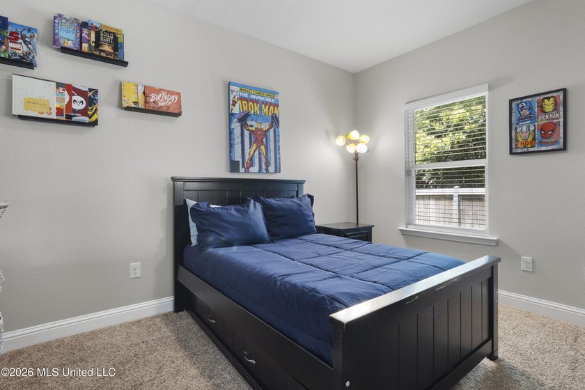 Welcome home to this beautifully maintained 4-bedroom, 3-bath - photo 27