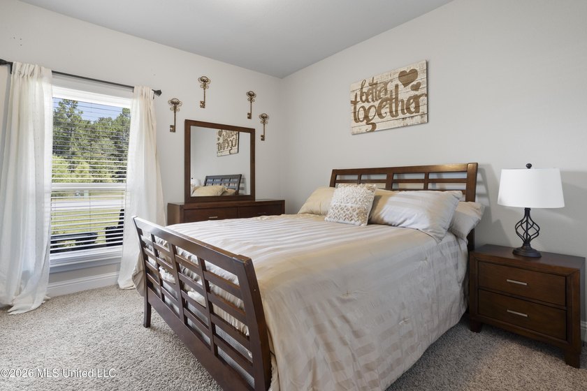 Welcome home to this beautifully maintained 4-bedroom, 3-bath - photo 28