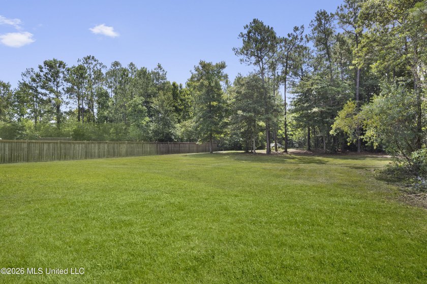 Welcome home to this beautifully maintained 4-bedroom, 3-bath - photo 33