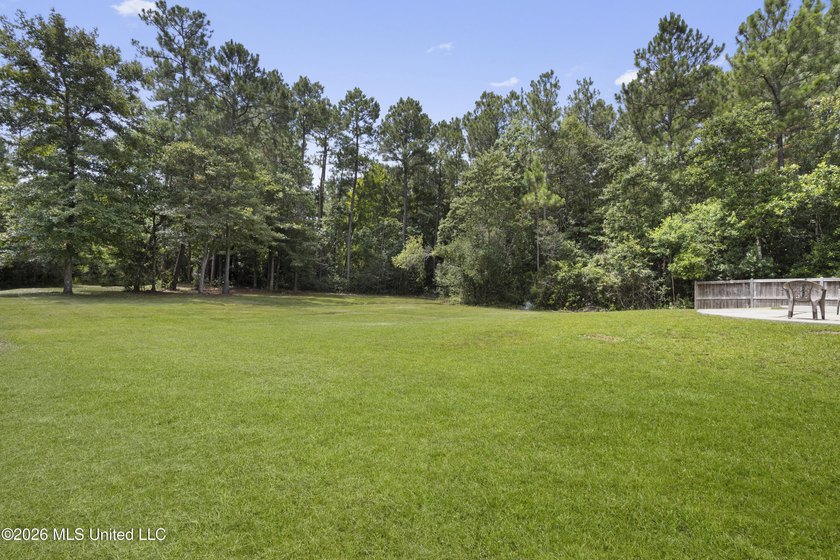 Welcome home to this beautifully maintained 4-bedroom, 3-bath - photo 34
