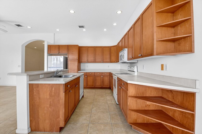 Welcome home to Madison Green! This 3-bedroom, 2-bath home is - photo 18