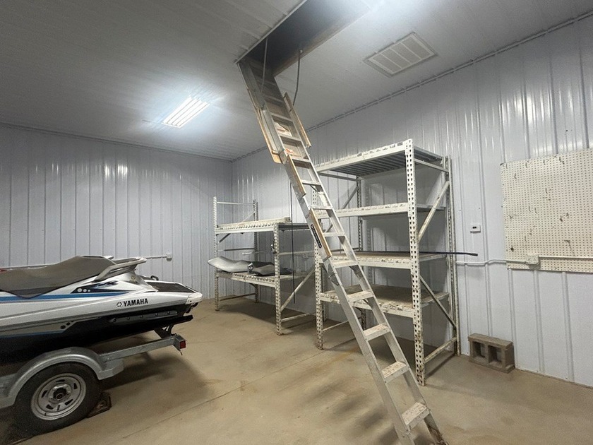 Enjoy nearly an acre of level waterfront property where the - photo 15