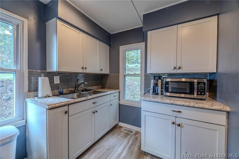 Adorable and fully renovated lake home on the 77-mile marker of - photo 11