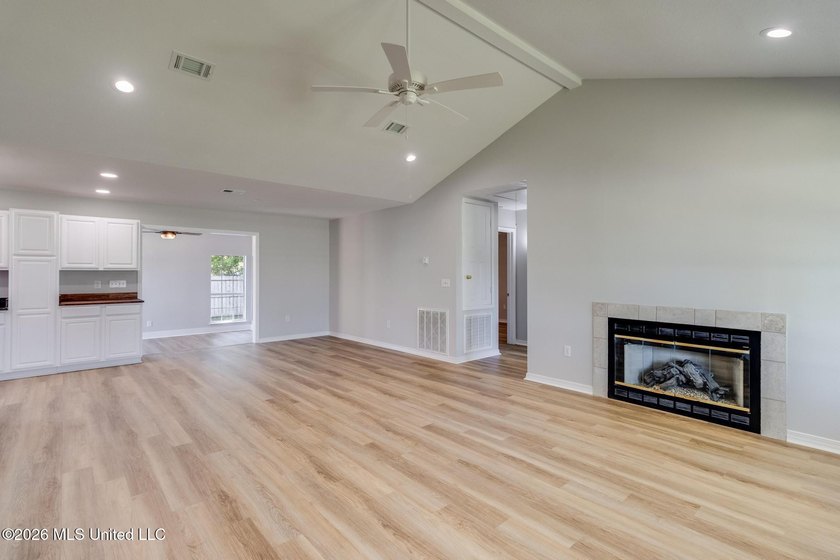 Beautifully updated home featuring an open floor plan, vaulted - photo 4