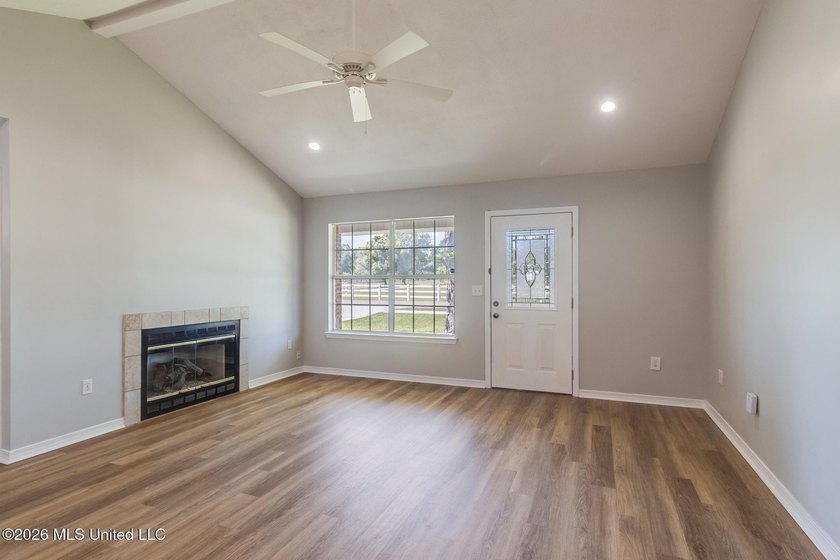 Beautifully updated home featuring an open floor plan, vaulted - photo 5