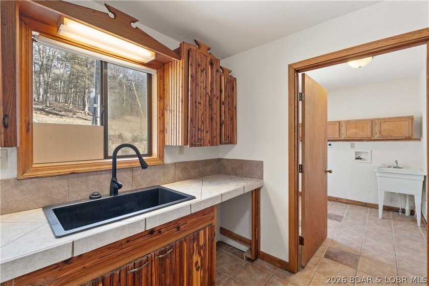 BRAND NEW ROOF!! Situated on 3/4 of an acre in a private setting - photo 11
