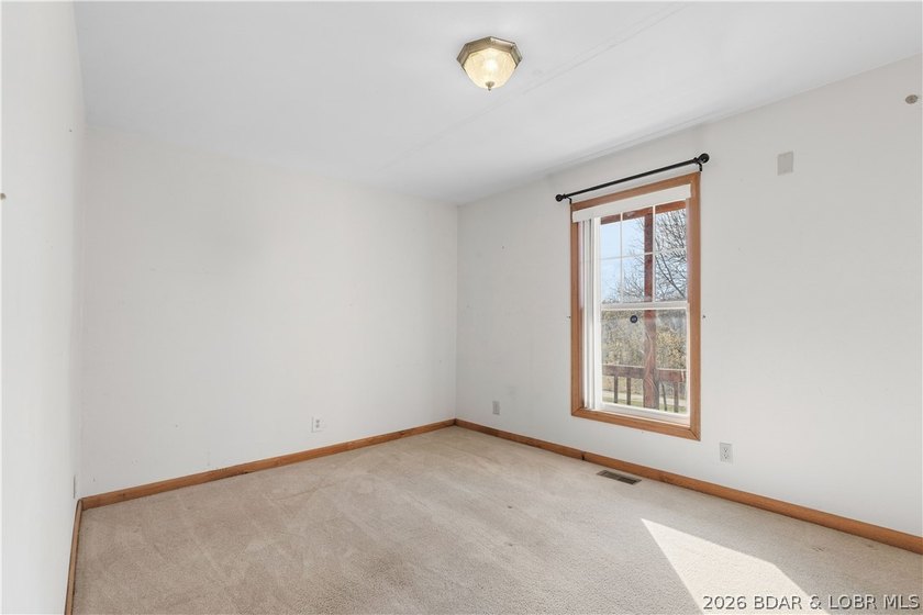 BRAND NEW ROOF!! Situated on 3/4 of an acre in a private setting - photo 13