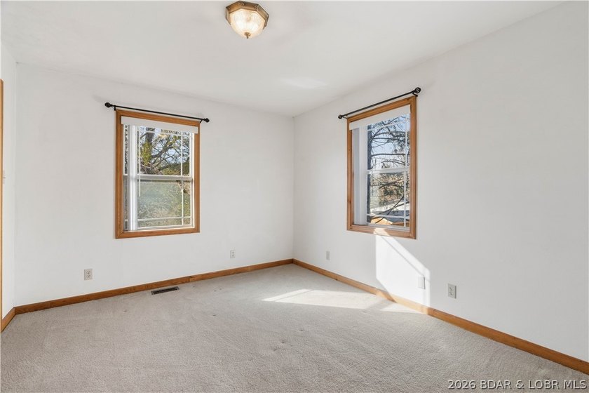 BRAND NEW ROOF!! Situated on 3/4 of an acre in a private setting - photo 15