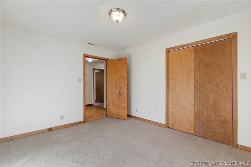 BRAND NEW ROOF!! Situated on 3/4 of an acre in a private setting - photo 16