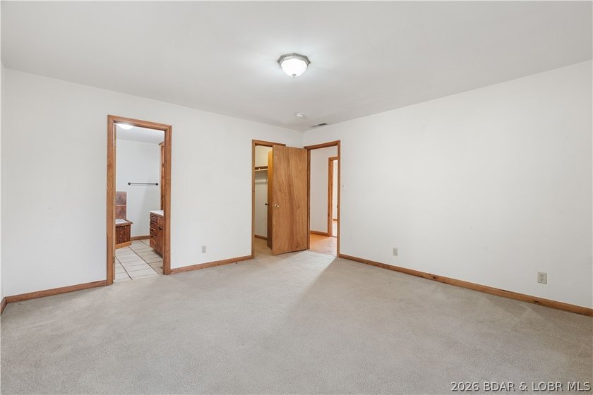 BRAND NEW ROOF!! Situated on 3/4 of an acre in a private setting - photo 18
