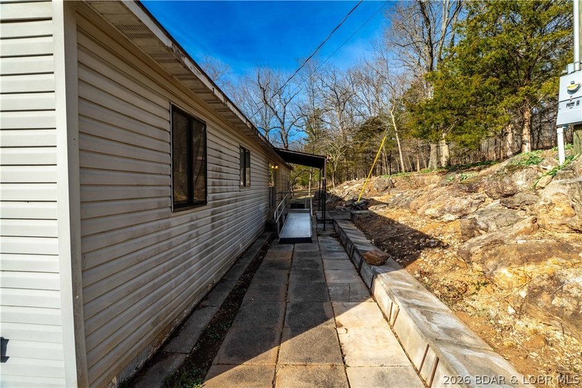 BRAND NEW ROOF!! Situated on 3/4 of an acre in a private setting - photo 25