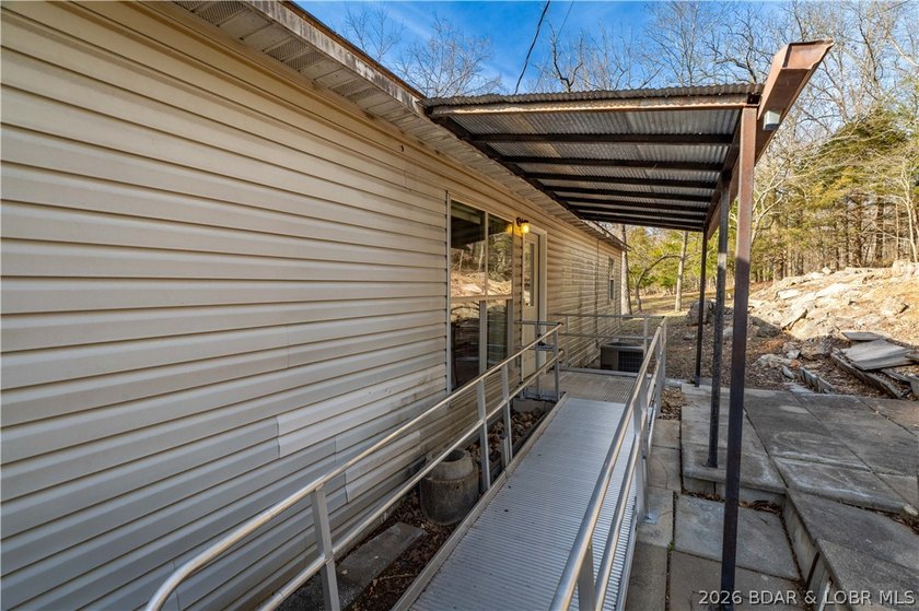 BRAND NEW ROOF!! Situated on 3/4 of an acre in a private setting - photo 26