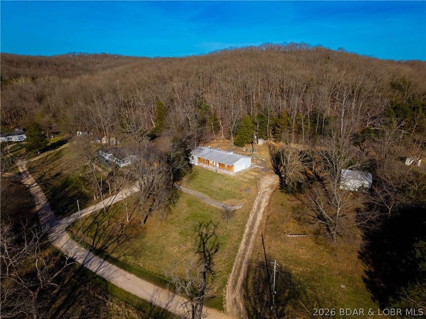 BRAND NEW ROOF!! Situated on 3/4 of an acre in a private setting - photo 43