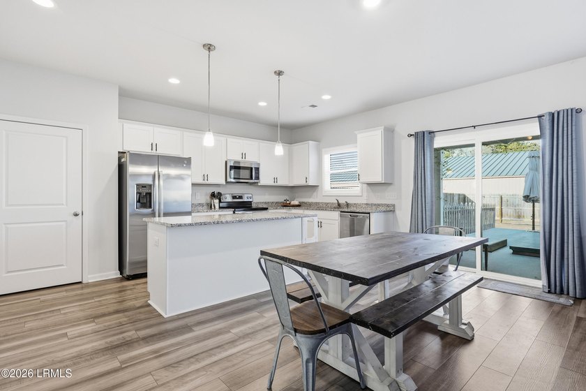 This 4-bedroom, 3 full-bath home offers a spacious and - photo 14