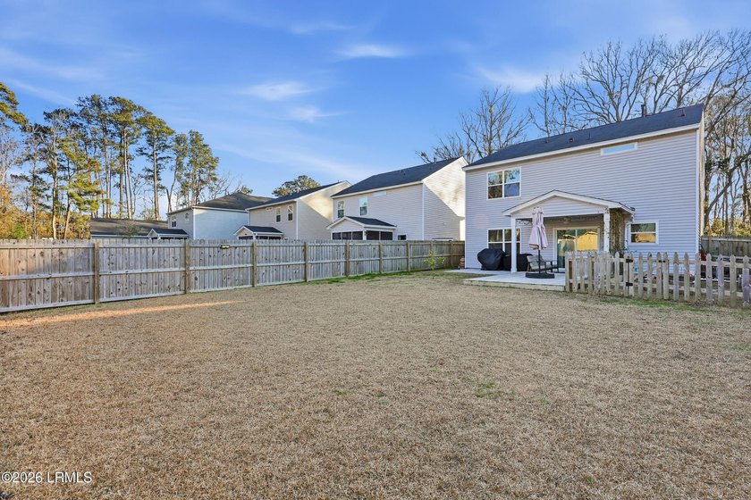 This 4-bedroom, 3 full-bath home offers a spacious and - photo 32