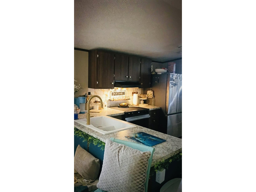 Come take a look at this 2024 barely lived in 2/2 Mobile home on - photo 8