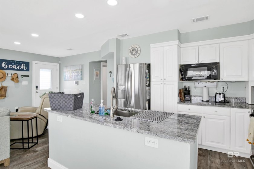 Beautifully upgraded bayfront home on a private road with no - photo 11