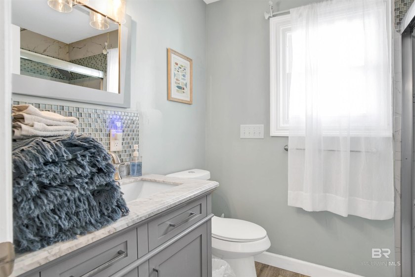 Beautifully upgraded bayfront home on a private road with no - photo 22