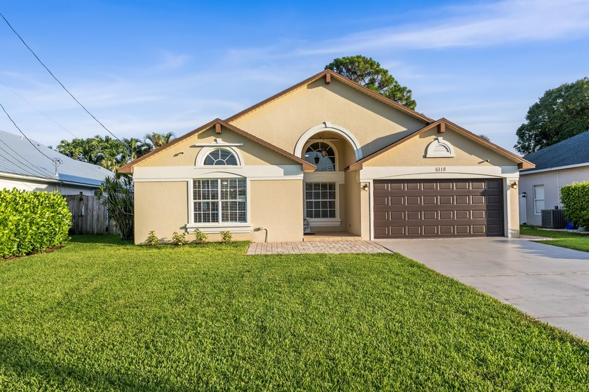 This well-maintained single-family residence is located in the - photo 2