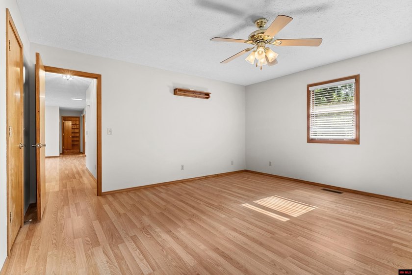 Spacious brick home on a beautiful corner lot offering over half - photo 23