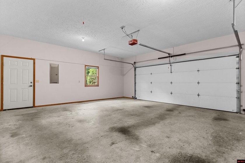 Spacious brick home on a beautiful corner lot offering over half - photo 26