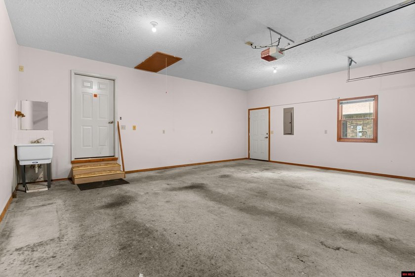 Spacious brick home on a beautiful corner lot offering over half - photo 27