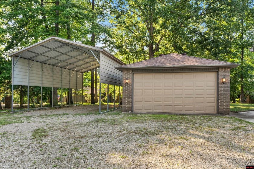 Spacious brick home on a beautiful corner lot offering over half - photo 34