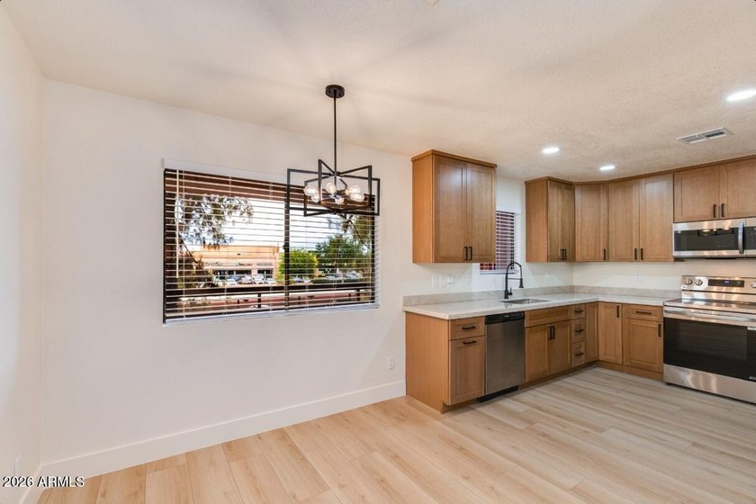 Beautifully remodeled condominium with stunning views of a - photo 8