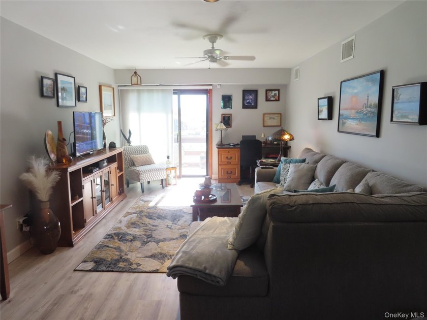 Perched in a prime upper-unit location with break taking views - photo 13